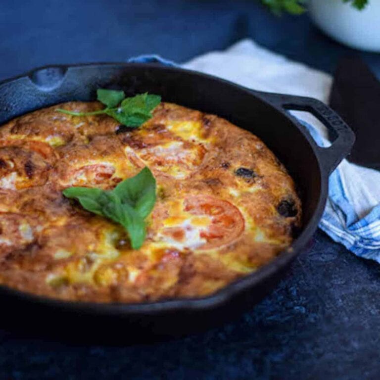 mediterranean frittata in a cast iron skillet