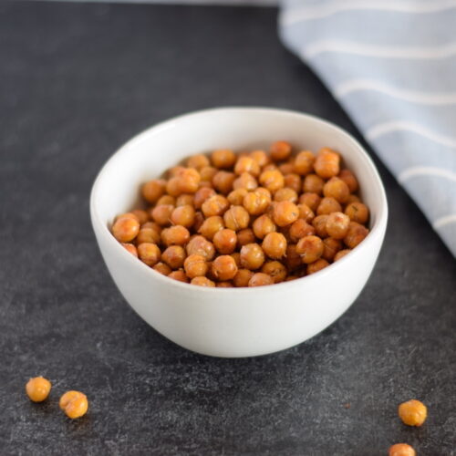 white bowl filled with crispy garbanzo beans.