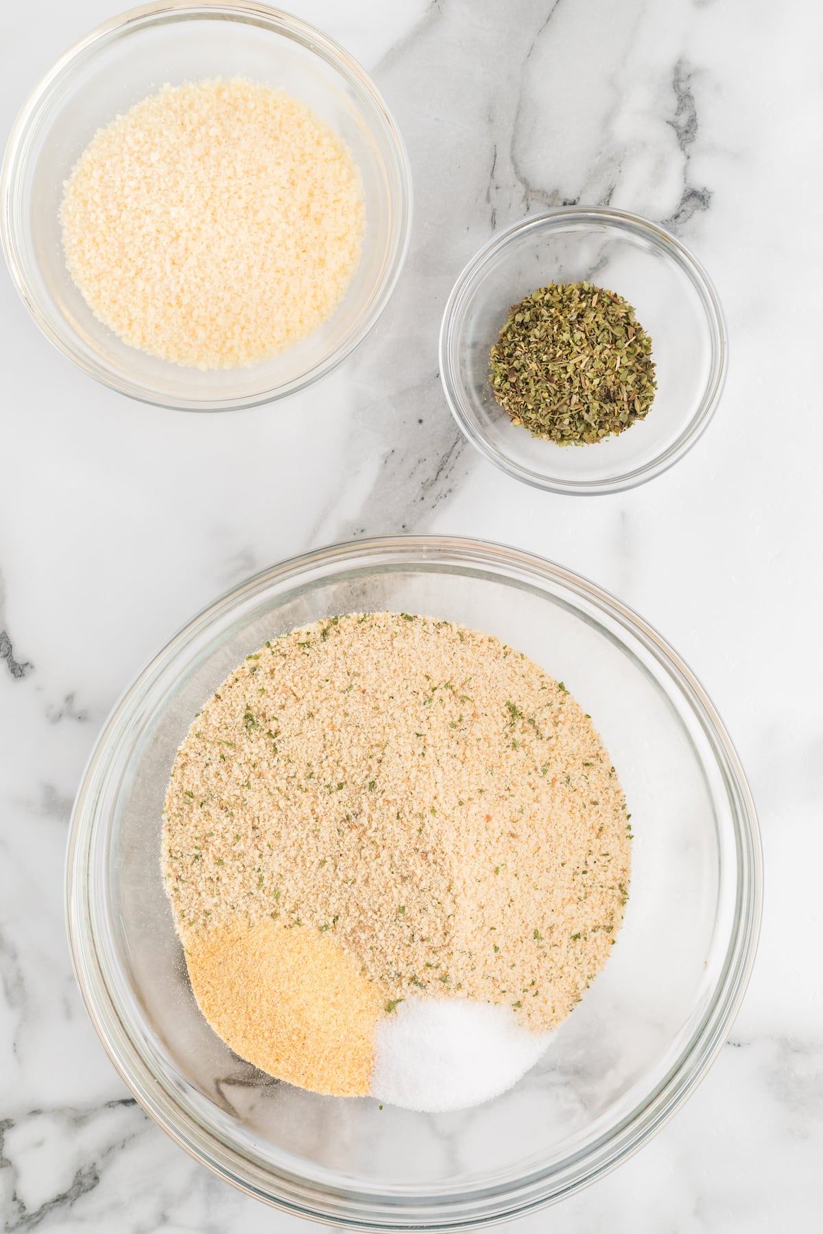 italian style breadcrumbs with seasonings in small bowls.
