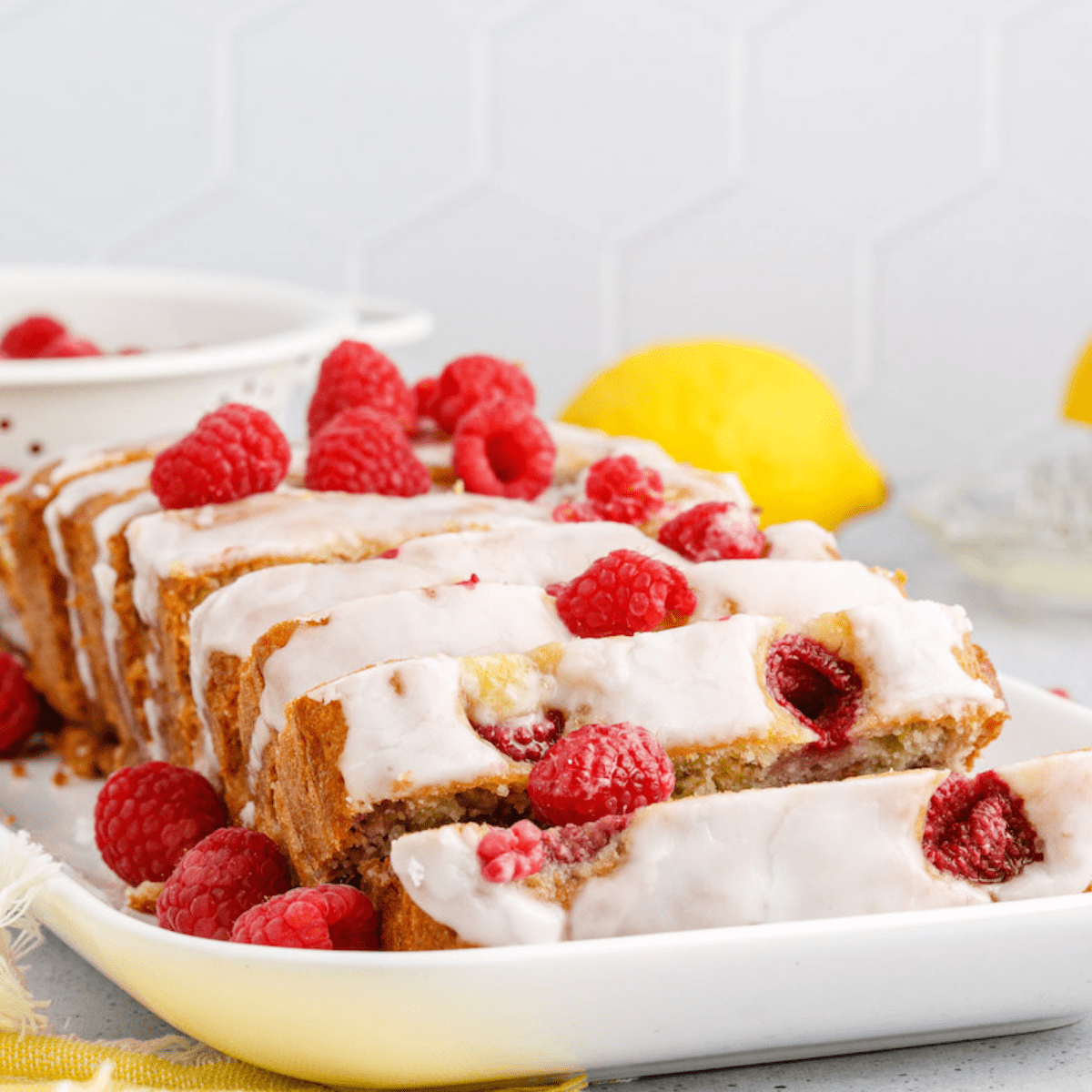 lemon raspberry bread on a white plate.
