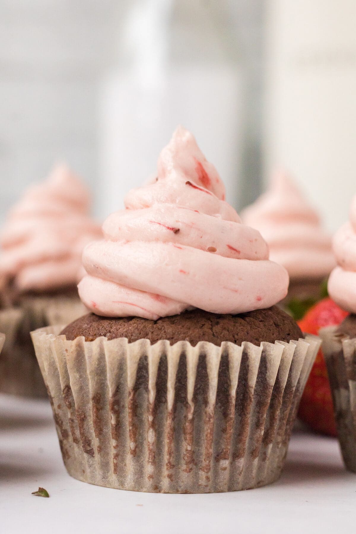 strawberry frosting over the chocolate nutella cupcakes. 