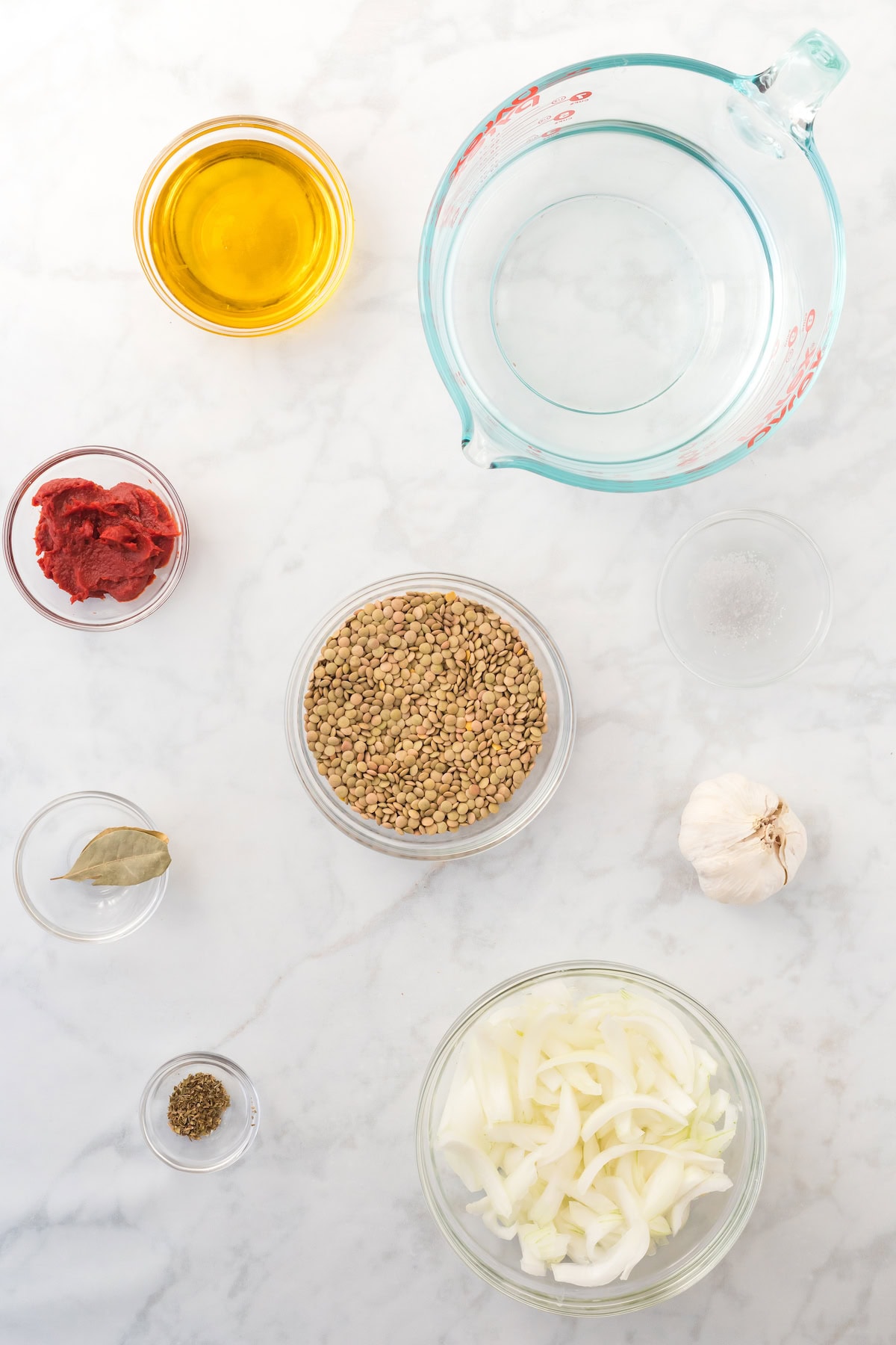 ingredients for the Mediterranean lentil soup in small bowls. 