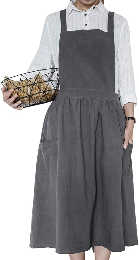 lady wearing a dark gray apron. 