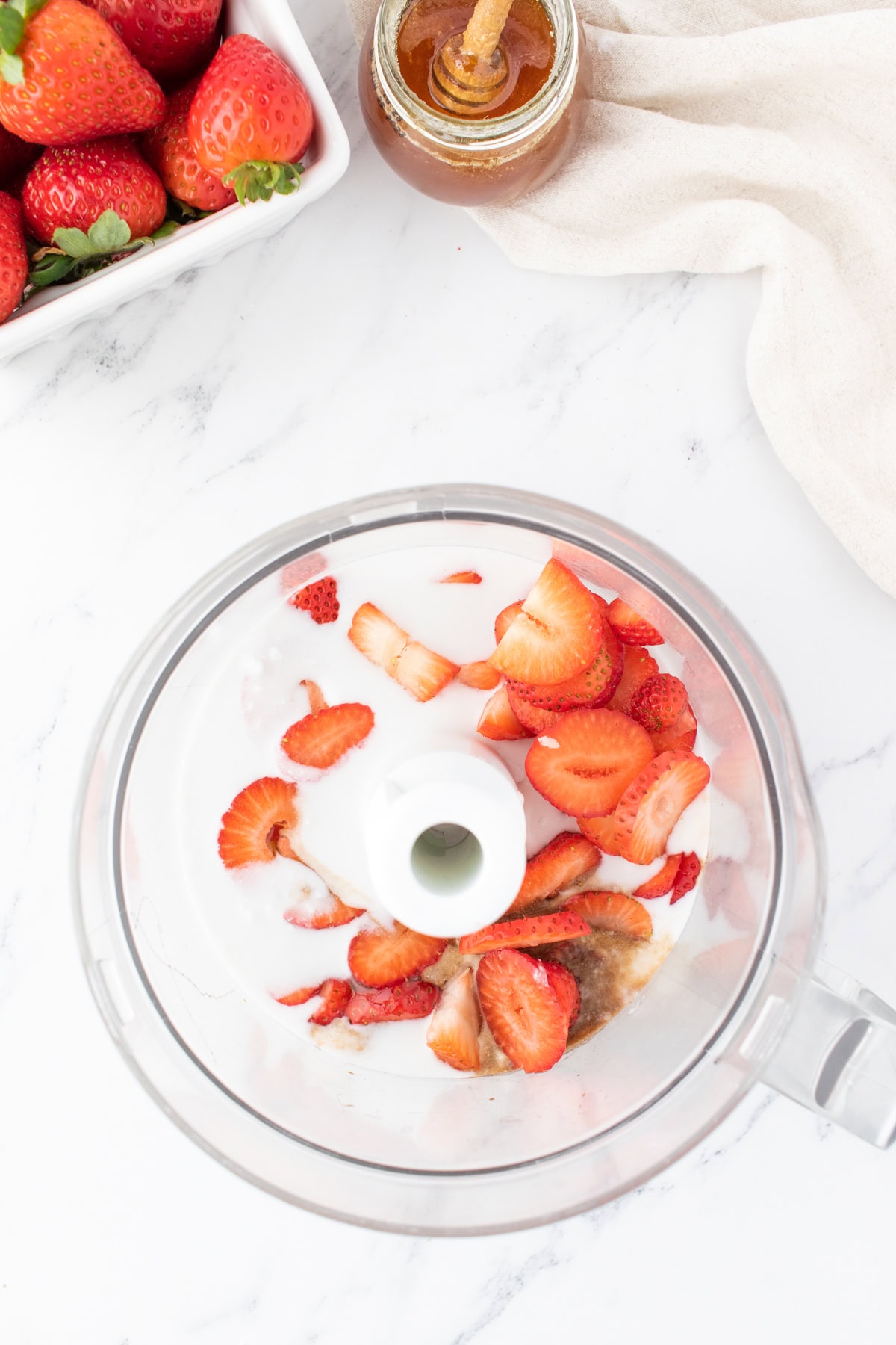 strawberries in a food processor. 